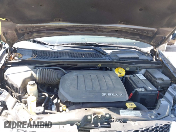 2015 Dodge Grand Caravan SXT with VIN 2C4RDGCG4FR631362, listed as a IAAI auction lot 42027066 with 149,599 mi miles and . Bid and sale history available at DreamBid. Image 10.