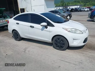 2012 Ford Fiesta S z VIN 3FADP4AJ5CM219930, wystawiony jako IAAI lot #42465008 z przebiegiem 79 085 mil mil oraz . Historia ofert i sprzedaży dostępna na DreamBid. Obrazek 1.