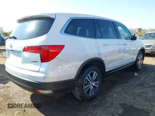 2016 Honda Pilot EX-L with VIN 5FNYF6H5XGB066295, listed as a IAAI auction lot 42063630 with 156,734 mi miles. Bid and sale history available at carsss.com. Image 4.