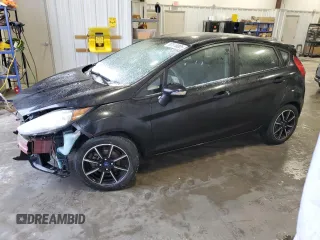 2015 Ford Fiesta SE with VIN 3FADP4EJ3FM127021, listed as a Copart auction lot 87516005 with 141,024 mi miles and Salvage Title. Bid and sale history available at carsss.com. Image 1.