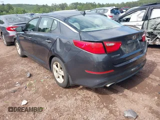 2015 Kia Optima LX z VIN KNAGM4A73F5639519, wystawiony jako IAAI lot #42266700 z przebiegiem 131 101 mil mil oraz . Historia ofert i sprzedaży dostępna na DreamBid. Obrazek 3.