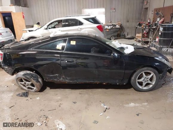 2005 Toyota Celica GTS with VIN JTDDY38T850074672, listed as a IAAI auction lot 41827053 with NaN miles. Bid and sale history available at carsss.com. Image 13.