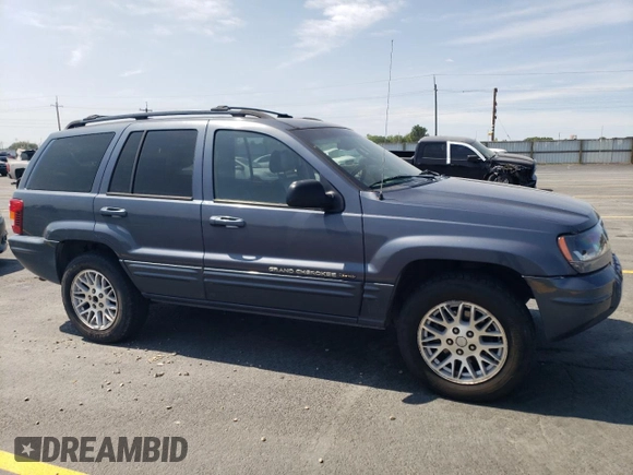 2004 Jeep Grand Cherokee Limited z VIN 1J4GW58S34C330987, wystawiony jako Copart lot #59089675 z przebiegiem 249 335 mil mil oraz Szkoda całkowita • Salvage title. Historia ofert i sprzedaży dostępna na DreamBid. Obrazek 4.
