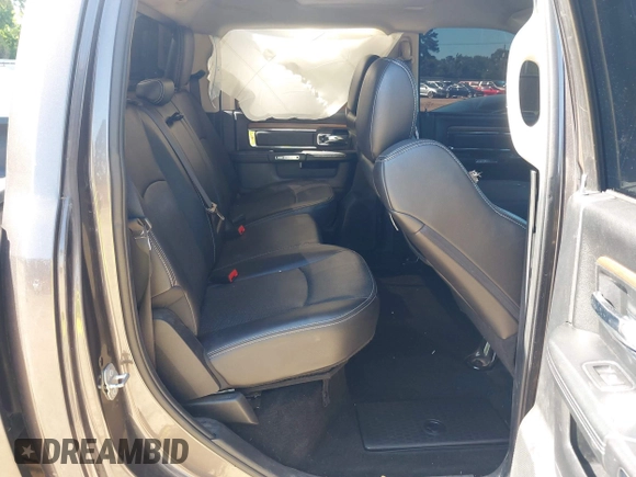 2015 Ram 2500 Laramie z VIN 3C6UR5FL6FG708769, wystawiony jako IAAI lot #42299173 z przebiegiem 101 660 mil mil oraz . Historia ofert i sprzedaży dostępna na DreamBid. Obrazek 8.