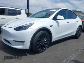 2022 Tesla Model Y Performance with VIN 7SAYGDEF8NF407109, listed as a IAAI auction lot 42014282 with 24,937 mi miles and . Bid and sale history available at DreamBid. Image 19.