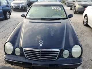 2000 Mercedes-Benz E-Class with VIN WDBJF65J7YB047628, listed as a Copart auction lot 75278704 with 0 mi miles and Salvage Title. Bid and sale history available at carsss.com. Image 5.