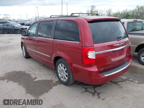 2013 Chrysler Town & Country Touring with VIN 2C4RC1BG4DR604063, listed as a IAAI auction lot 42029869 with 173,309 mi miles. Bid and sale history available at carsss.com. Image 3.