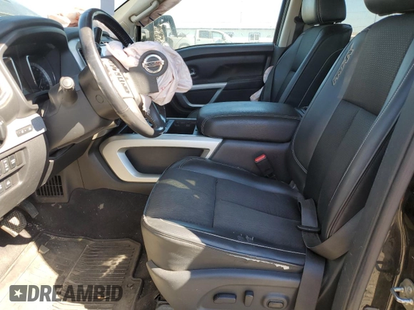 2017 Nissan Titan Pro-4X z VIN 1N6BA1F42HN530830, wystawiony jako Copart lot #63860384 z przebiegiem 317 812 mil mil oraz Szkoda całkowita • Salvage title. Historia ofert i sprzedaży dostępna na DreamBid. Obrazek 7.