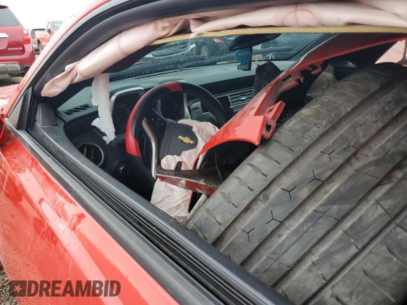 2012 Chevrolet Camaro 1LT z VIN 2G1FB1E35C9130405, wystawiony jako Copart lot #57352075 z przebiegiem Nie podano mil oraz Szkoda całkowita • Salvage title. Historia ofert i sprzedaży dostępna na DreamBid. Obrazek 8.