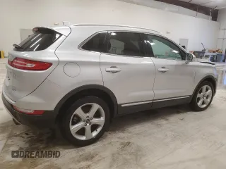 2018 Lincoln MKC Premiere with VIN 5LMCJ1C90JUL07472, listed as a Copart auction lot 50595015 with 74,989 mi miles and Salvage Title. Bid and sale history available at DreamBid. Image 3.