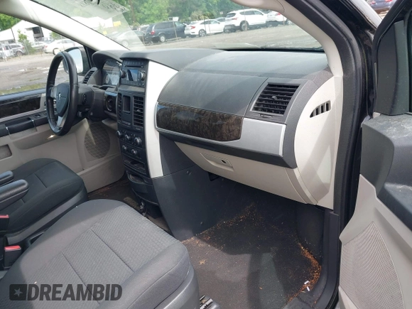 2010 Dodge Grand Caravan SXT with VIN 2D4RN5D11AR459864, listed as a IAAI auction lot 42197818 with 149,553 mi miles and . Bid and sale history available at DreamBid. Image 5.