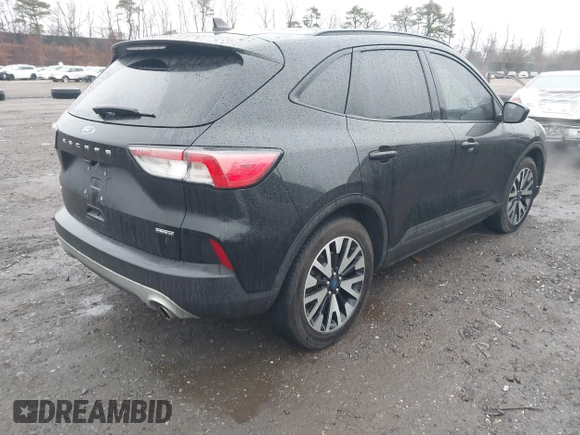 2020 Ford Escape SE Sport Hybrid with VIN 1FMCU9BZ9LUC24975, listed as a IAAI auction lot 41445033 with 93,262 mi miles and . Bid and sale history available at DreamBid. Image 4.