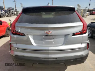 2024 Cadillac XT4 AWD Luxury with VIN 1GYFZBR40RF150020, listed as a Copart auction lot 46184565 with 9,188 mi miles and Salvage Title. Bid and sale history available at carsss.com. Image 6.