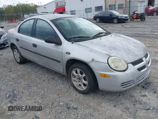 2005 Dodge Neon SE with VIN 1B3ES26C35D205066, listed as a IAAI auction lot 41943955 with 129,821 mi miles. Bid and sale history available at carsss.com. Image 1.