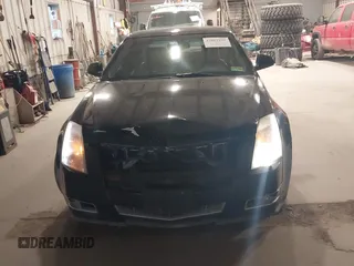 2009 Cadillac CTS AWD w/1SB with VIN 1G6DT57V290152885, listed as a IAAI auction lot 42063192 with 146,119 mi miles. Bid and sale history available at carsss.com. Image 6.