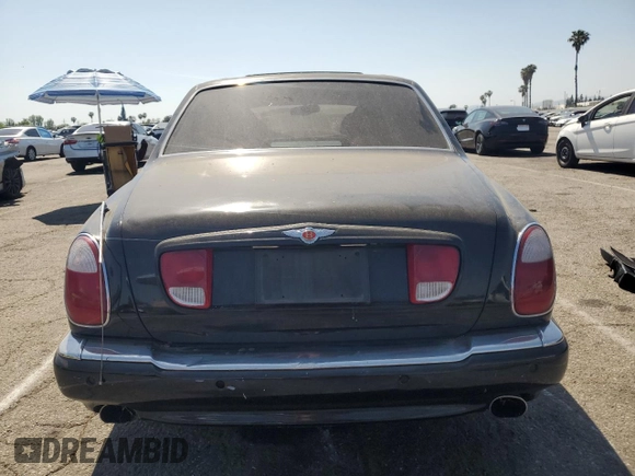 2001 Bentley Arnage с VIN SCBLC31E81CX05759, выставлен на аукционе Copart как лот 56231445 с пробегом Не указан миль и Чистый • Clean title. История ставок и продаж доступна на DreamBid. Изображение 6.
