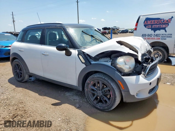 2015 MINI Countryman with VIN WMWZB3C52FWR43973, listed as a Copart auction lot 56751695 with 117,096 mi miles and Salvage title. Bid and sale history available at DreamBid. Image 4.
