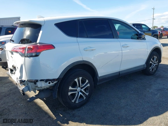 2018 Toyota RAV4 LE with VIN 2T3ZFREV8JW467744, listed as a IAAI auction lot 41818614 with 95,609 mi miles. Bid and sale history available at carsss.com. Image 4.