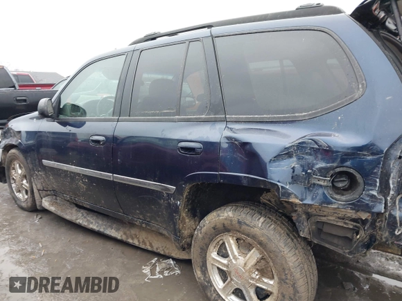 2006 GMC Envoy SLE z VIN 1GKDT13S862329493, wystawiony jako IAAI lot #41513303 z przebiegiem 118 355 mil mil oraz . Historia ofert i sprzedaży dostępna na DreamBid. Obrazek 14.