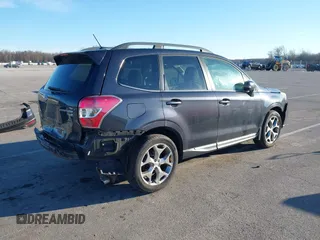 2015 Subaru Forester 2.5i Touring with VIN JF2SJAUC2FH827235, listed as a IAAI auction lot 41692229 with 182,123 mi miles. Bid and sale history available at carsss.com. Image 4.