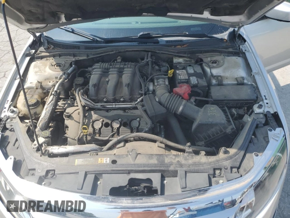2012 Ford Fusion SEL z VIN 3FAHP0JG3CR178411, wystawiony jako Copart lot #59526405 z przebiegiem 208 550 mil mil oraz Szkoda całkowita • Salvage title. Historia ofert i sprzedaży dostępna na DreamBid. Obrazek 11.