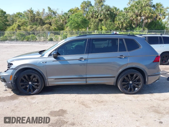 2020 Volkswagen Tiguan SE with VIN 3VV3B7AX3LM176300, listed as a IAAI auction lot 42004744 with 86,074 mi miles and . Bid and sale history available at DreamBid. Image 14.