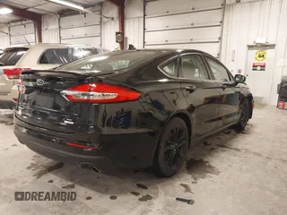 2019 Ford Fusion SE with VIN 3FA6P0HD5KR284103, listed as a IAAI auction lot 41477133 with 90,722 mi miles and . Bid and sale history available at carsss.com. Image 4.