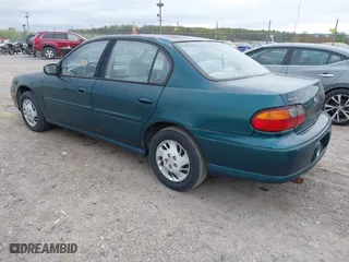 1998 Chevrolet Malibu with VIN 1G1ND52M8WY142896, listed as a IAAI auction lot 42074243 with 118,401 mi miles. Bid and sale history available at carsss.com. Image 3.