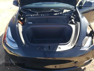 2023 Tesla Model Y Performance with VIN 7SAYGDEF3PF773031, listed as a Copart auction lot 47105765 with 25,604 mi miles and Salvage Title. Bid and sale history available at DreamBid. Image 11.