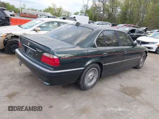 2001 BMW 7 Series 740iA with VIN WBAGG83451DN87732, listed as a IAAI auction lot 42083005 with 208,778 mi miles. Bid and sale history available at carsss.com. Image 4.