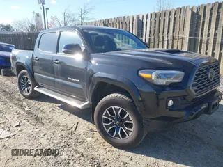 2022 Toyota Tacoma SR with VIN 3TYCZ5AN0NT066728, listed as a IAAI auction lot 41799395 with 28,088 mi miles and . Bid and sale history available at DreamBid. Image 1.