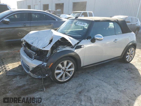 2015 MINI Convertible with VIN WMWZN3C50FT861992, listed as a Copart auction lot 84189754 with Not provided miles and Salvage title. Bid and sale history available at DreamBid. Image 1.