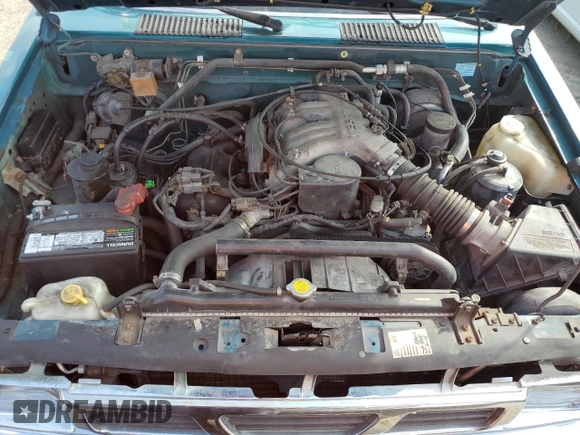 1995 Nissan Frontier XE z VIN 1N6HD16S3SC463075, wystawiony jako Copart lot #76235934 z przebiegiem 122 466 mil mil oraz Szkoda całkowita • Salvage title. Historia ofert i sprzedaży dostępna na DreamBid. Obrazek 11.