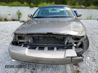 2005 Mercury Grand Marquis GS z VIN 2MEFM74W05X673934, wystawiony jako Copart lot #52608785 z przebiegiem 170 558 mil mil oraz Szkody całkowita. Historia ofert i sprzedaży dostępna na DreamBid. Obrazek 5.