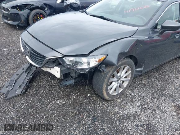 2016 Mazda 6 i Sport with VIN JM1GJ1U55G1472416, listed as a IAAI auction lot 41961622 with 157,315 mi miles and . Bid and sale history available at DreamBid. Image 6.