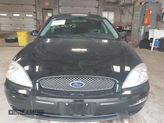 2004 Ford Taurus SE z VIN 1FAFP53U74G107504, wystawiony jako IAAI lot #42068692 z przebiegiem Nie podano mil oraz . Historia ofert i sprzedaży dostępna na DreamBid. Obrazek 12.