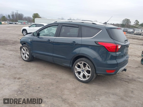 2019 Ford Escape Titanium with VIN 1FMCU9J93KUB84831, listed as a IAAI auction lot 41514146 with 105,072 mi miles. Bid and sale history available at carsss.com. Image 3.