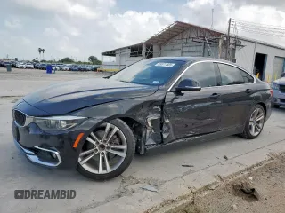 2019 BMW 4 Series 430i with VIN WBA4J1C50KBM14296, listed as a Copart auction lot 59377685 with 115,827 mi miles and Salvage title. Bid and sale history available at DreamBid. Image 1.