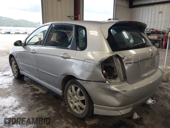 2006 Kia Spectra with VIN KNAFE161X65283615, listed as a IAAI auction lot 41955968 with 185,177 mi miles. Bid and sale history available at carsss.com. Image 3.