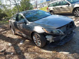 2014 Kia Optima SXL Turbo with VIN 5XXGR4A69EG284510, listed as a IAAI auction lot 41901608 with 81,877 mi miles and . Bid and sale history available at DreamBid. Image 1.