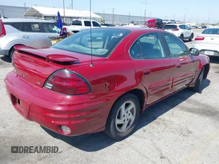 1999 Pontiac Grand Am SE2 with VIN 1G2NE52T0XM702788, listed as a IAAI auction lot 42564414 with 195,067 mi miles and . Bid and sale history available at DreamBid. Image 4.