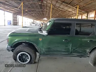 2023 Ford Bronco with VIN 1FMEE5DP9PLB29838, listed as a Copart auction lot 62409785 with 11,124 mi miles and Salvage title. Bid and sale history available at DreamBid. Image 13.