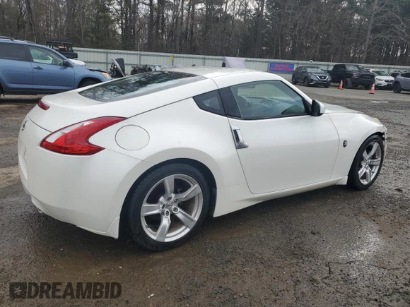 2012 Nissan 370Z z VIN JN1AZ4EHXCM562486, wystawiony jako Copart lot #44594005 z przebiegiem 79 150 mil mil oraz Szkoda całkowita • Salvage title. Historia ofert i sprzedaży dostępna na DreamBid. Obrazek 3.