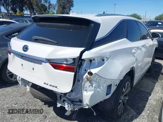 2018 Lexus RX with VIN JTJGZKCA0J2004007, listed as a IAAI auction lot 41382473 with 104,630 mi miles. Bid and sale history available at carsss.com. Image 4.