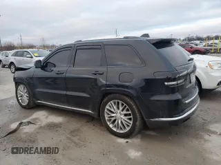 2018 Jeep Grand Cherokee Summit with VIN 1C4RJFJT2JC390079, listed as a Copart auction lot 43502555 with 106,724 mi miles and Salvage title. Bid and sale history available at DreamBid. Image 2.