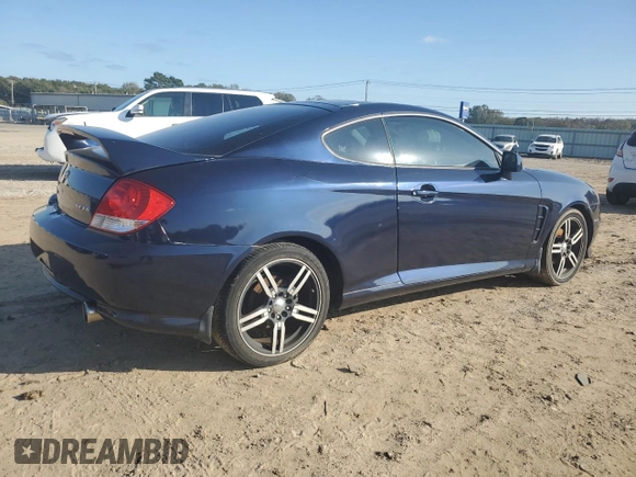 2005 Hyundai Tiburon GT z VIN KMHHN65F85U158764, wystawiony jako Copart lot #80060884 z przebiegiem 121 747 mil mil oraz Czysty tytuł • Clean title. Historia ofert i sprzedaży dostępna na DreamBid. Obrazek 3.