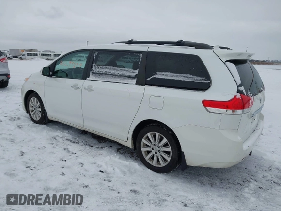2013 Toyota Sienna XLE with VIN 5TDDK3DC2DS053559, listed as a IAAI auction lot 41299824 with 175,611 mi miles and . Bid and sale history available at DreamBid. Image 3.