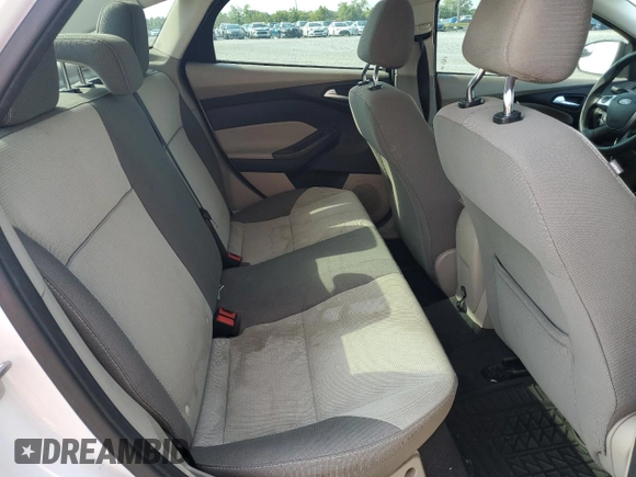 2012 Ford Focus SE z VIN 1FAHP3F2XCL310660, wystawiony jako Copart lot #60217625 z przebiegiem 208 807 mil mil oraz Szkoda całkowita • Salvage title. Historia ofert i sprzedaży dostępna na DreamBid. Obrazek 10.