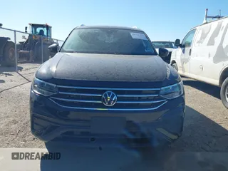 2023 Volkswagen Tiguan SE with VIN 3VV3B7AX3PM085470, listed as a IAAI auction lot 41731153 with 14,911 mi miles and . Bid and sale history available at DreamBid. Image 13.