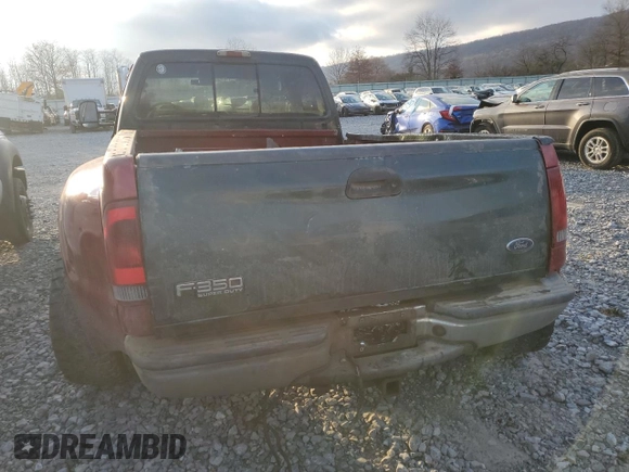 2003 Ford F-350 XL with VIN 1FTWW33F63EA29777, listed as a Copart auction lot 81047684 with 214,722 mi miles and Salvage Title. Bid and sale history available at DreamBid. Image 6.